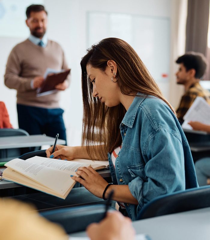 female-student-taking-notes-during-a-class-at-the-2023-11-27-05-31-22-utc.jpg